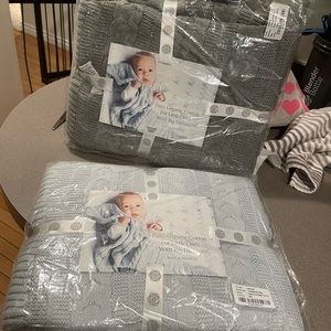 Two Boll & Branch baby cable knit blankets